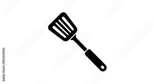 Black spatula kitchen cooking utensil.