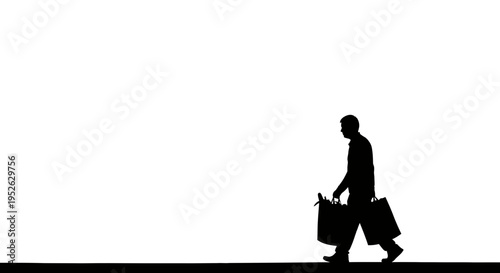 Businessman walking with luggage silhouette.