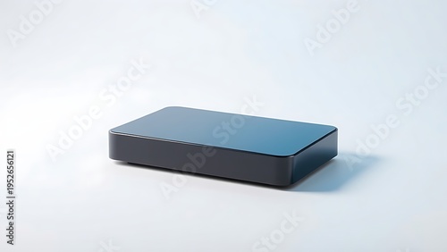 Sleek rectangular device with glossy finish on a gradient backdrop, exemplifying minimalist technological aesthetics.