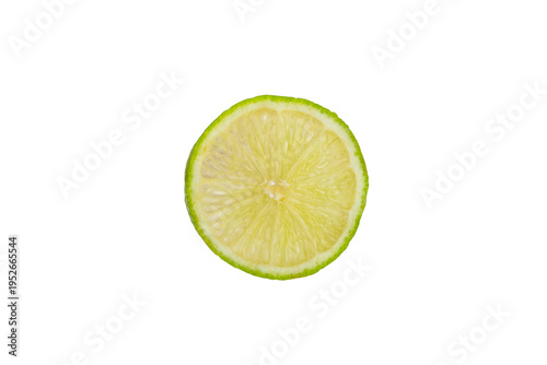 Fresh lime isolated on white background. Whole limes and slices in a bowl. Citrus. Vitamin C. Detox diet. Tropical fruits. Summer refreshing lemonade or mojito concept.