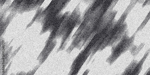 Dynamic monochrome abstract background with diagonal streaks of dark ink-like smudges over a grainy speckled white surface, suggesting movement and artistic expression