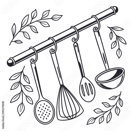 Set of kitchen utensils hanging on a rack with decorative leafy branches, including a skimmer, whisk, slotted spoon, and ladle for cooking