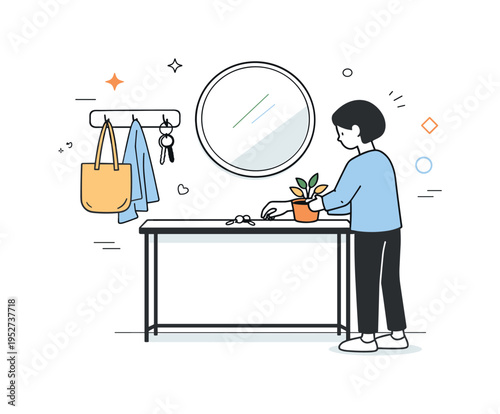 Creating a functional entryway with style. A person arranges a slim console table, mirror and wall hooks, neatly placing keys and a small plant on the surface.