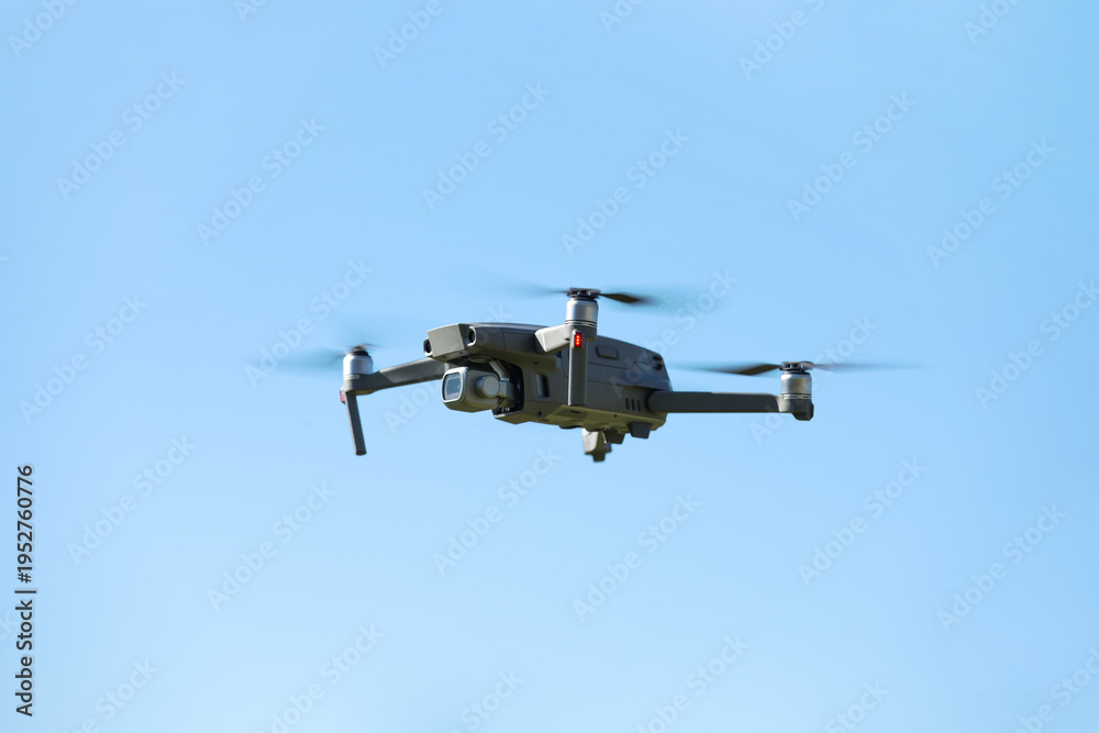Fototapeta premium The drone copter flying with digital camera.