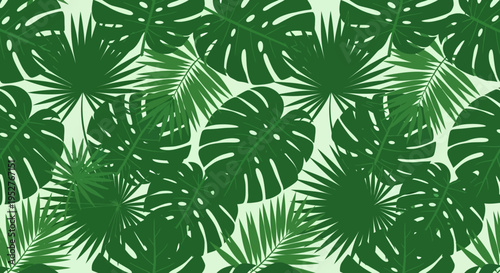 Tropical green palm leaves pattern on light background