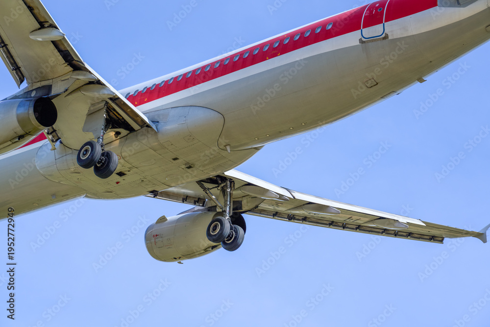 Fototapeta premium Close-up of a commercial airliner approaching for landing