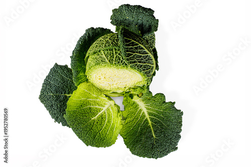 Half savoy cabbage isolated on white background