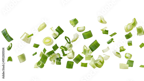 Chopped green onions flying through the air against a black background isolated on transparent background