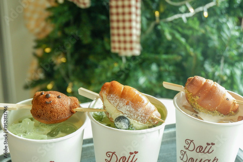 Mini cute bread on Matcha ice latte and Ice coffee latte on table in cafe,espresso,dieting,menu popular for girl, healthy drinks concept,copy space for text.