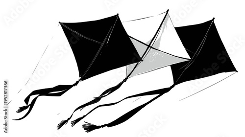 Three diamond kites in black and white against a plain white background
