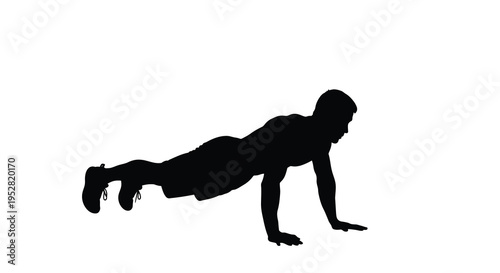 A silhouette of a man performing a push up exercise against a stark white background demonstrating strength and fitness