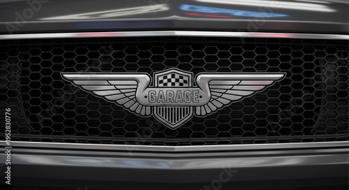 Close-up of a car grill with a winged emblem.