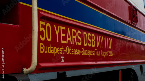 Anniversary lettering on vintage red locomotive