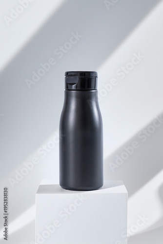 pot of cream or shampoo in bathroom ready to use and put label