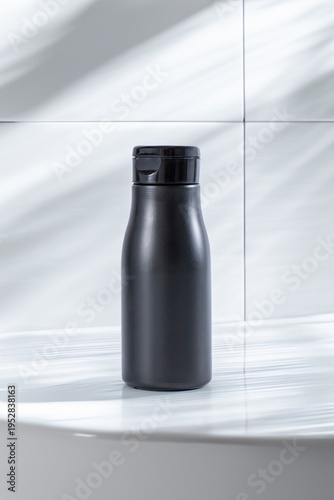 pot of cream or shampoo in bathroom ready to use and put label