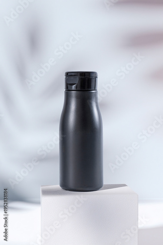 pot of cream or shampoo in bathroom ready to use and put label