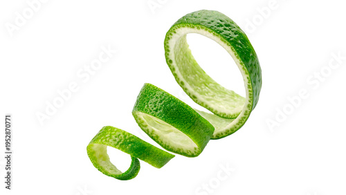 Fotografía Lime peel being cut into spirals in kitchen during preparation of food for a mea