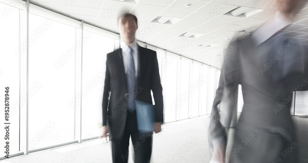 Fototapeta premium businessman in office blurred in motion