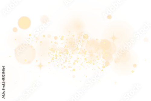 Twinkling golden dust drifts across a soft bokeh background with radiant flare and glowing highlights. Sparkling yellow particles and shimmering blur add a magical Christmas and New Year atmosphere