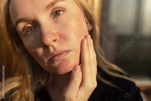 Wallpaper Mural Close-up of female face with enlarged pores and oily skin, visible texture, redness on chin. Natural light beauty portrait, skincare concerns, dermatology concept. Torontodigital.ca