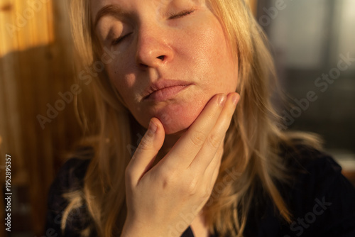 Wallpaper Mural Close-up of female face with enlarged pores and oily skin, visible texture, redness on chin. Natural light beauty portrait, skincare concerns, dermatology concept. Torontodigital.ca