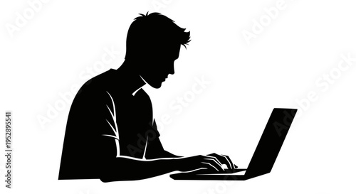 Silhouette of a man working on a laptop computer in a focused posture