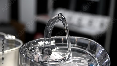 Glass tap with drinking water. Water tap