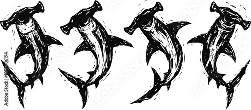 set of four black and white hammerhead shark silhouettes in different swimming poses