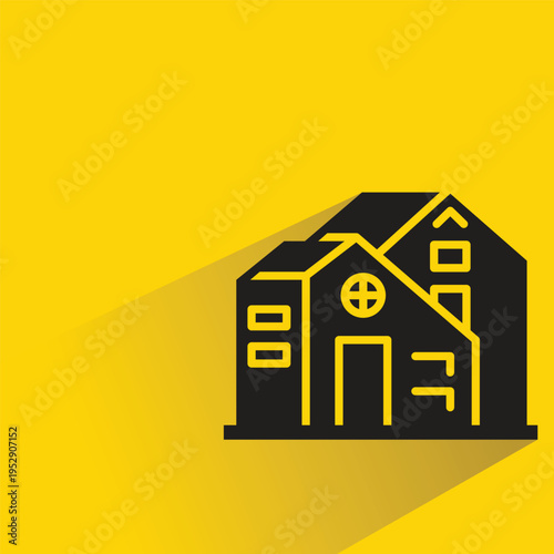 house building icon with shadow on yellow background