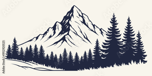 Majestic mountain peak surrounded by a dense forest of evergreen trees