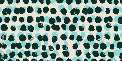 A seamless vector pattern of abstract organic blobs in deep forest green and soft turquoise on warm cream background