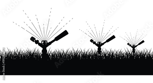 Silhouette of three lawn sprinklers irrigating grass on a white background