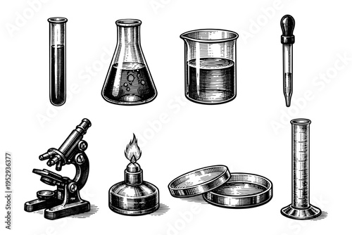 Vintage scientific laboratory equipment collection with microscope, burner, and glassware