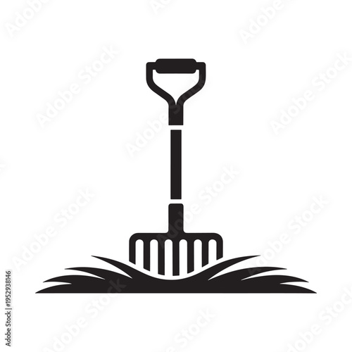 A simple black icon depicting a garden rake resting on grass