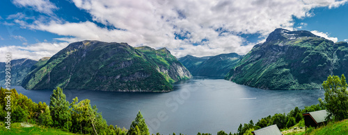 Woman at the viewpoint to Geirangerfjord at Hellesylt oin norway