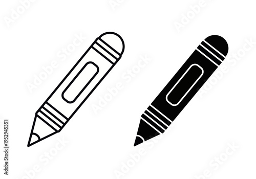 Two colorful pencils lie on a white surface in a creative workspace indoors.