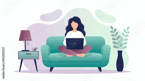 Young female marketing manager sitting on couch using laptop, concept for remote working, digital nomad lifestyle and home office productivity