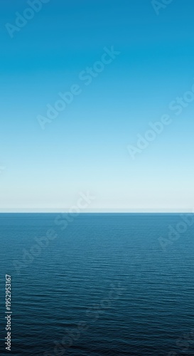Vast, empty ocean meeting a clear, featureless sky at the perfect horizon line. Peaceful, tranquil scene suggesting freedom and endless opportunity, empty, space, simple