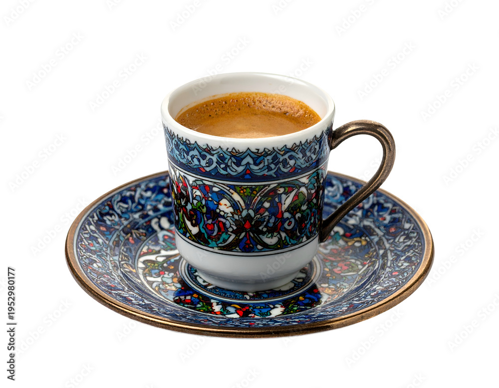 Fototapeta premium Ornate blue cup and saucer filled with rich, foamy coffee