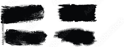 A collection of four black ink brush strokes on a white background for artistic and design purposes