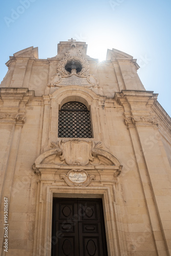 Facade and entrance of the Church of Our Lady of Victory in sunlight, Valletta MALTA