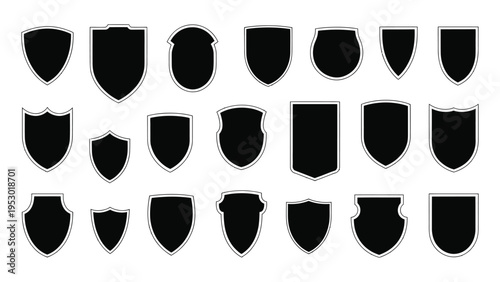 A collection of twenty different black shield shapes and crest icons isolated on a transparent background representing security and emblems