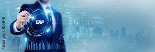 Business manager using a pen while analyzing data ERP Enterprise Resource Planning and business systems, workflow integration, resource management, enterprise software, operational efficiency