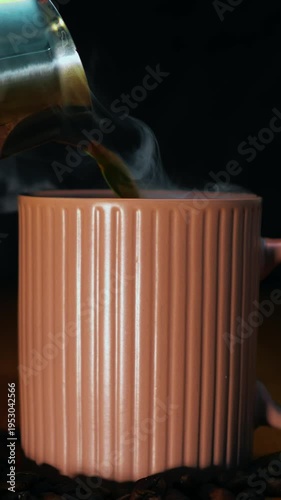 Hot coffee poured into pink mug, closeup barista style pour with rising steam over ribbed ceramic, beans scattered on wooden surface, warm moody lighting, cinematic texture and rich aroma