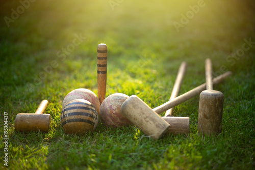 Tablou pe pânză Wooden set with clubs and a croquet ball