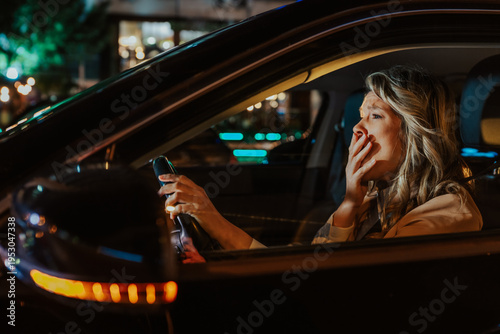 Konstfotografi Woman experiencing fear and panic while driving car at night, having a sudden ro