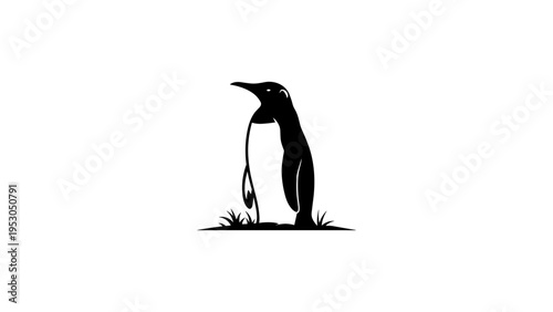 Silhouette of a penguin standing on grass with minimalist design