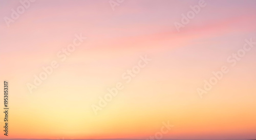 Vibrant sunset with warm hues of orange and pink gradient
