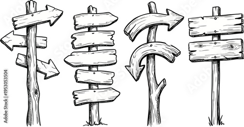 Rustic wooden signposts with blank arrows