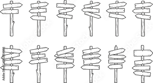 Set of wooden directional signs on rustic posts for navigation